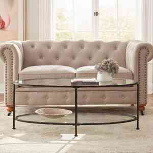 Home Decorators Collection Bella Large Oval Antique Bronze Metal and Glass Coffee Table with Shelf (46 in. W x 18 in. H)